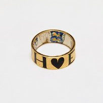 17th Century Wedding Ring- Enamelled gold ring, the hoop enamelled in black outside with 'EC' and 'EH' separated by four hearts and inside the arms of Chibnall, Haselwood, Wilmer and Andrews, England, 17th century.  Presumably commemorating a marriage of a Chibnall and a Haselwood.  (V&A Museum)